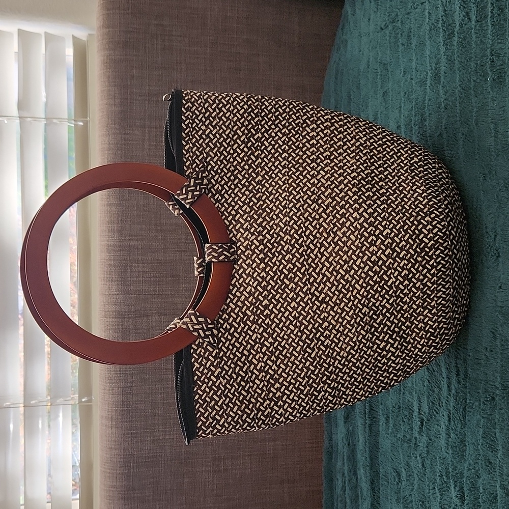 Woven straw bag with wood handles